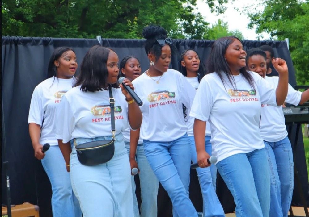 Young worship team singing outdoors